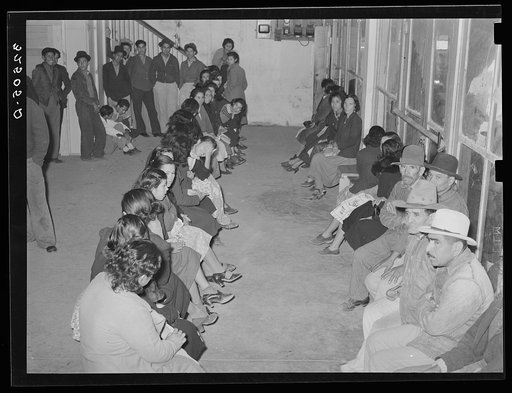 Mexican pecan workers waiting in union hall for assignment to work. San Antonio, Texas