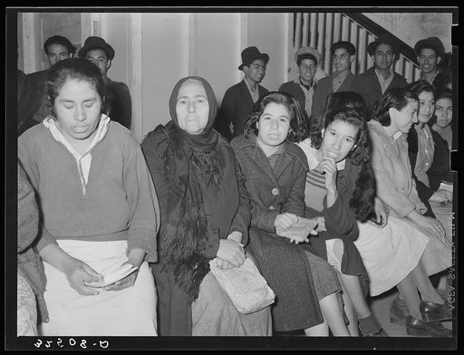 Mexican pecan workers waiting in union hall for assignment to work. San Antonio, Texas