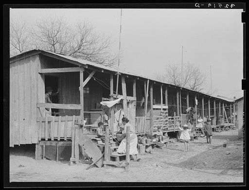 Row of houses facing on corral. San Antonio, Texas