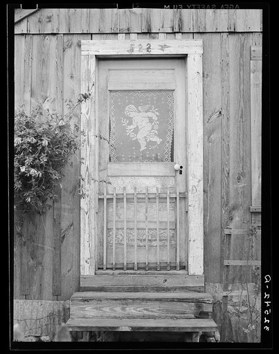 Front entrance to Mexican home. San Antonio, Texas. This is home done by hand work