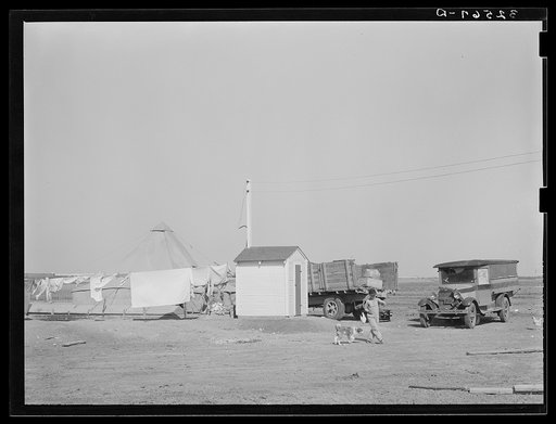 Pump house on farm. The camp of a brother who came to El Indio to look over the land before buying is also shown. Texas