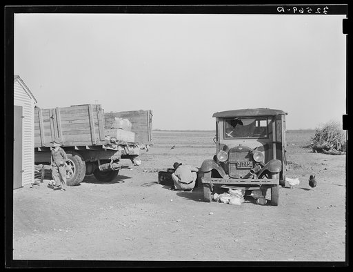 Untitled photo, possibly related to: Pump house on farm. The camp of a brother who came to El Indio to look over the land before buying is also shown. Texas