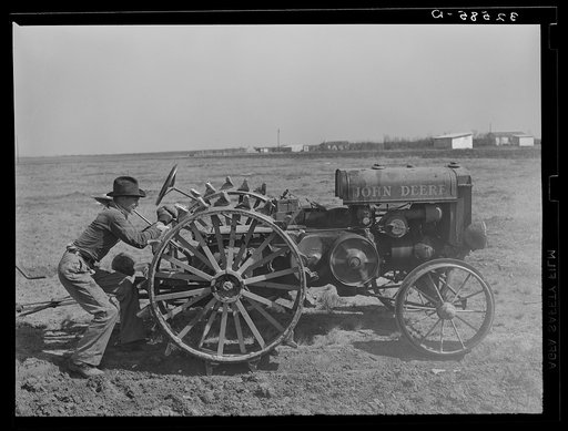 Testing clutch on tractor. El Indio, Texas