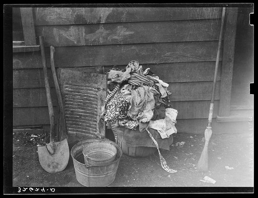 Untitled photo, possibly related to: Laundry and household and garden tools. Mexican section, San Antonio, Texas