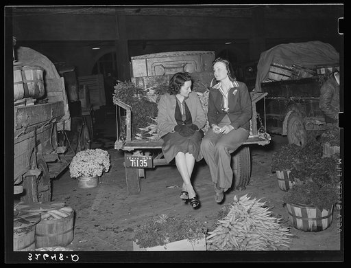Wives of vegetable peddlers sometimes accompany their husbands to the early morning market. San Antonio, Texas