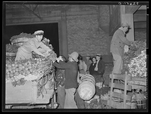 Activity in the early morning vegetable market. San Antonio, Texas