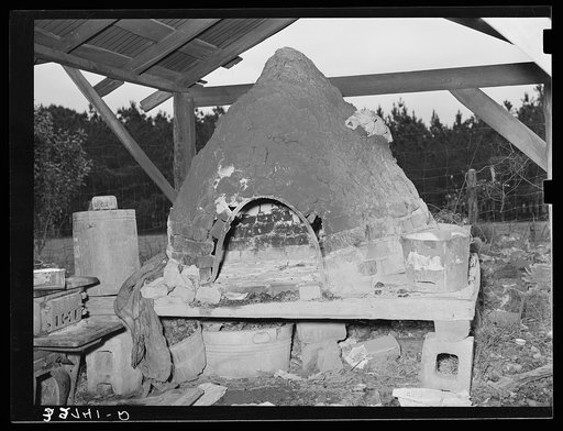 Oven of Italian strawberry grower near Independence, Louisiana. The Italians in this section all have these outdoor ovens and bake all their bread in them
