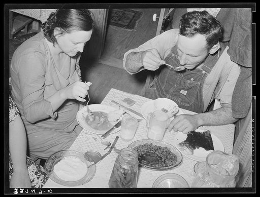 East Texas farmer and his wife eating dinner. Marshall, Texas