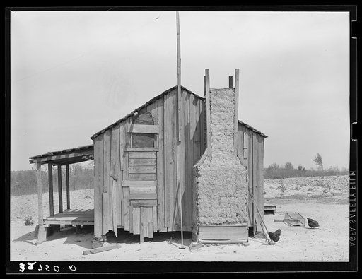 Home of tenant farmer with mud and straw chimney. Near Marshall, Texas