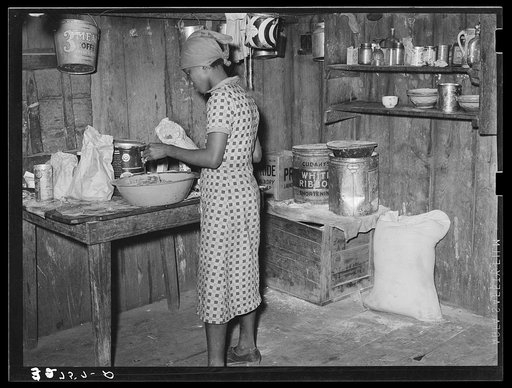 Negro woman living on farm near Jefferson, Texas, preparing dinner