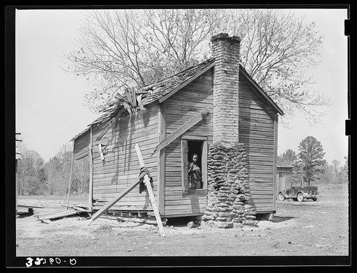 Cabin of Negroes living near Jefferson, Texas. This family owned about thirty acres but were not farming it, doing day labor for a living
