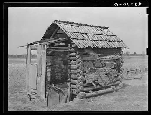 Log shed and privy near Jefferson, Texas