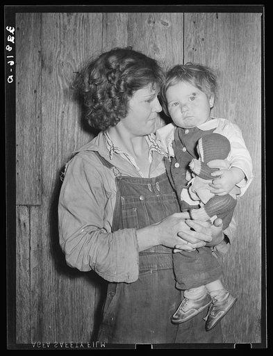 Migratory berry picker with her child. Ponchatoula, Louisiana