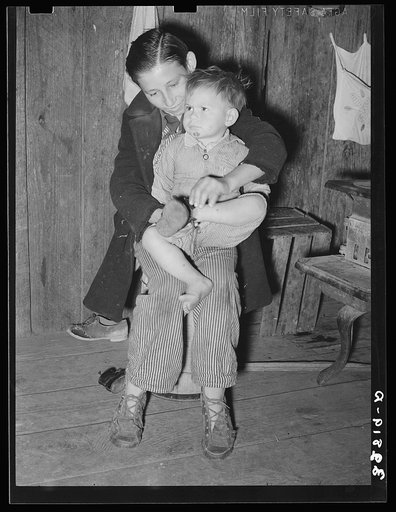 Untitled photo, possibly related to: Child of white migratory berry picker near Ponchatoula, Louisiana