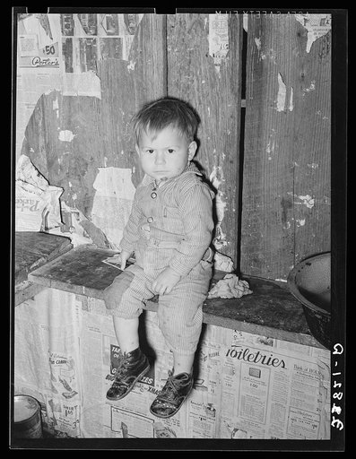 Child of white migratory berry picker near Ponchatoula, Louisiana