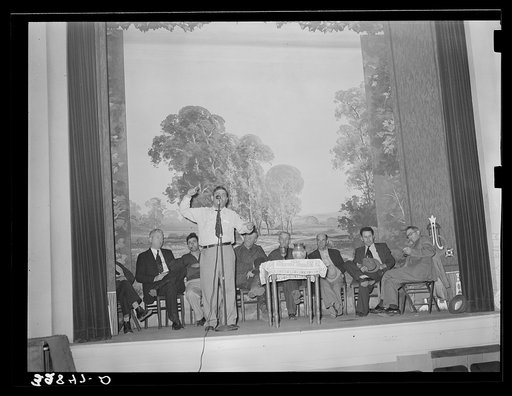 Speaker and farmers at meeting called to consider marketing and auctioning problems of the strawberry growers. There was much friction between the various organizations over the auctioning and selling of the berries. Independence, Louisiana
