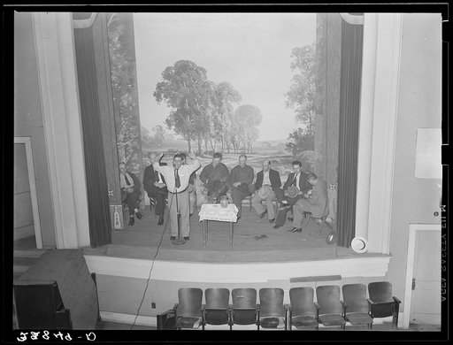 Untitled photo, possibly related to: Speaker and farmers at meeting called to consider marketing and auctioning problems of the strawberry growers. There was much friction between the various organizations over the auctioning and selling of the berries. Independence, Louisiana