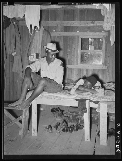 Scene in Negro bunkhouse on strawberry farm near Hammond, Louisiana