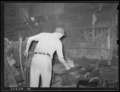 Blacksmith at work. San Augustine, Texas