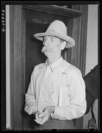 San Augustine County, Texas. Farmer in town