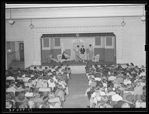 Untitled photo, possibly related to: Schoolchildren watching senior class play. San Augustine, Texas