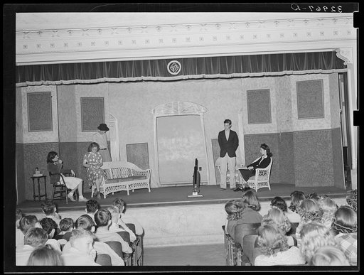 Schoolchildren watching senior class play. San Augustine, Texas