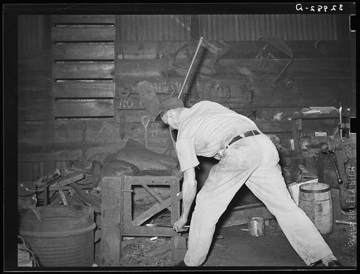 Blacksmith at work. San Augustine, Texas