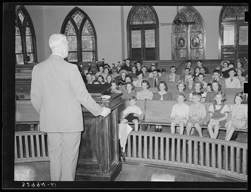 Minister preaching to his congregation. San Augustine, Texas