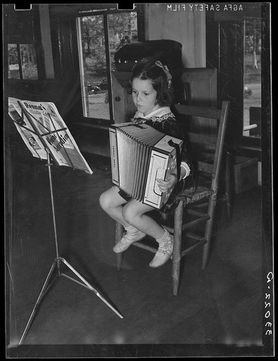 Young accordian player. Grade school, San Augustine, Texas