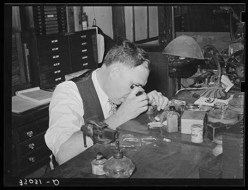 Jewler repairing a watch. San Augustine, Texas