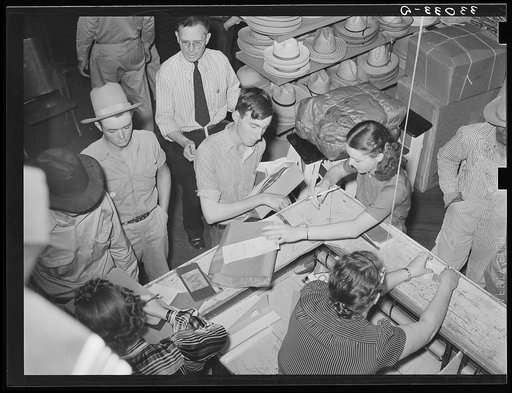 Cashier's desk in department store on Saturday afternoon. San Augustine, Texas