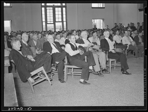 County judge conducting a mass meeting called to discuss ways and means to raise funds to continue WPA (Works Progress Administration/Work Projects Administration) roadwork in the county. San Augustine, Texas
