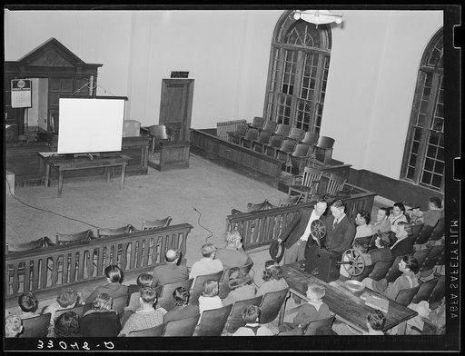 Waiting for Department of Agriculture movie to start. Courtroom, San Augustine, Texas