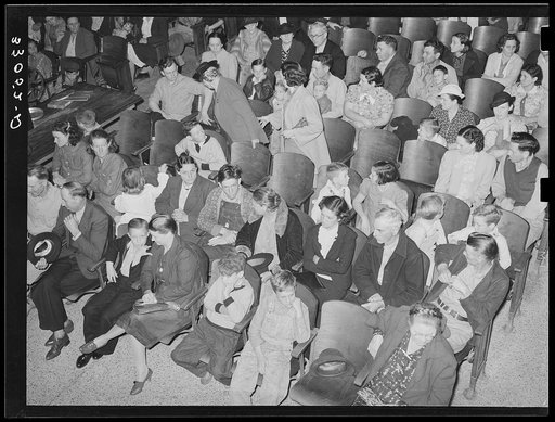 People waiting for Department of Agriculture movie. Courtroom, San Augustine, Texas