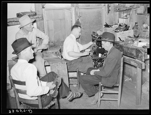 In the shoe repair shop. San Augustine, Texas