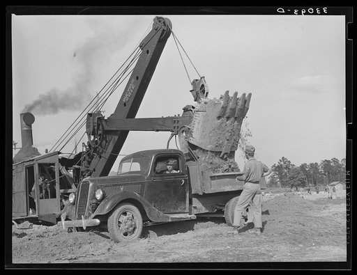 Steam shovel at work at paper mill. Lufkin, Texas