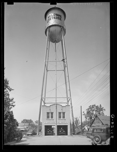 Fire station and water tank. Carthage, Texas