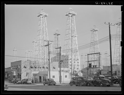 Untitled photo, possibly related to: Downtown section of Kilgore, Texas, studded with oil derricks