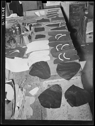 All the parts that go into the uppers of a pair of boots. Boot shop, Alpine, Texas