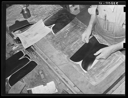 Stitching uppers together. Bootmaking shop, Alpine, Texas