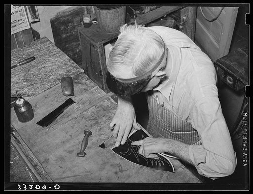 Attaching heel part of boot to uppers. Boot shop, Alpine, Texas