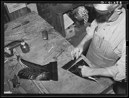 Attaching heel part of boot to uppers. Boot shop, Alpine, Texas