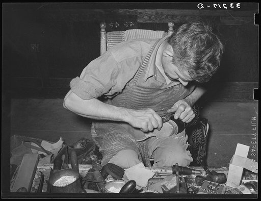 Shaping the heel of cowboy boot. Bootmaking shop, Alpine, Texas