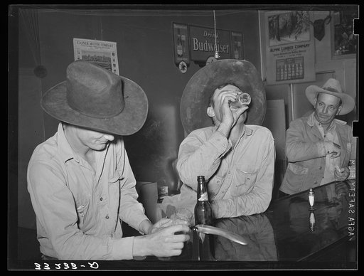 Cowboys in beer parlor. Alpine, Texas