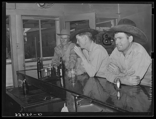 Cowboys in beer parlor. Alpine, Texas