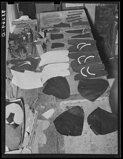 Untitled photo, possibly related to: All the parts that go into the uppers of a pair of boots. Boot shop, Alpine, Texas