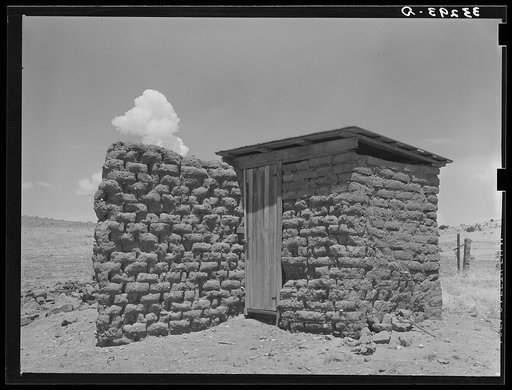 Adobe privy with windbreak. Old "Walking X" Ranch place near Marfa, Texas