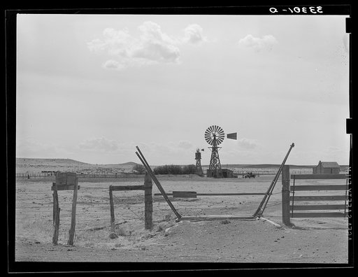 Cattle guard and windmill near Marfa, Texas