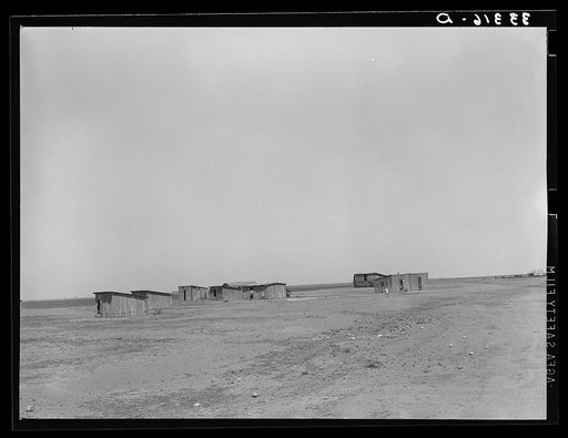 Homes of day laborers on large farm near Ralls, Texas. There are 4900 acres in this farm. Nine tractors are used