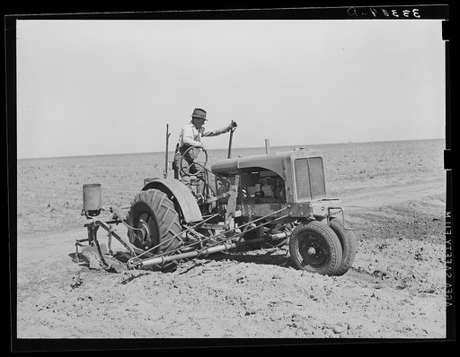 Tractor on large farm near Ralls, Texas